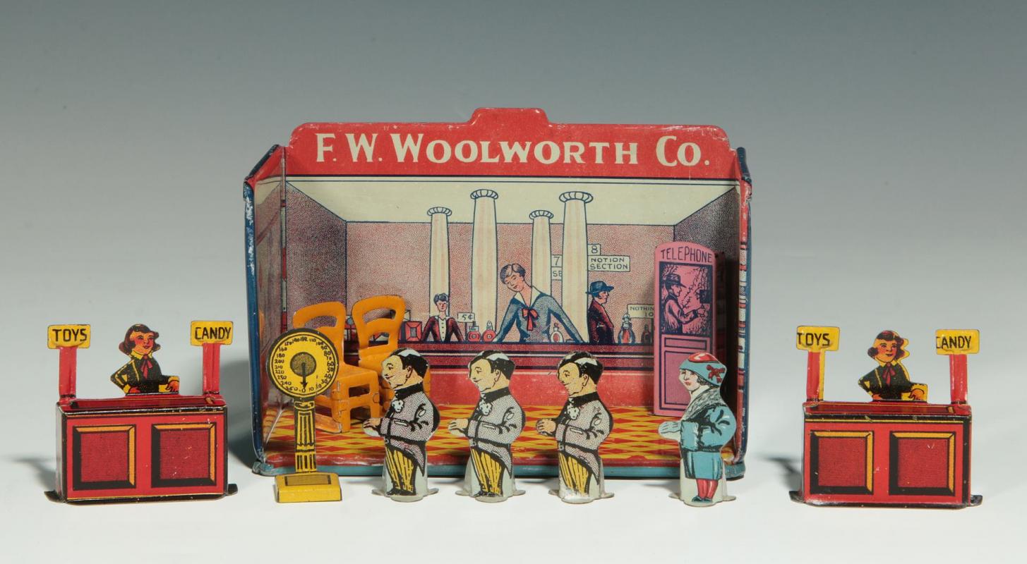 A MINIATURE TIN LITHO F.W. WOOLWORTH CO. STORE    