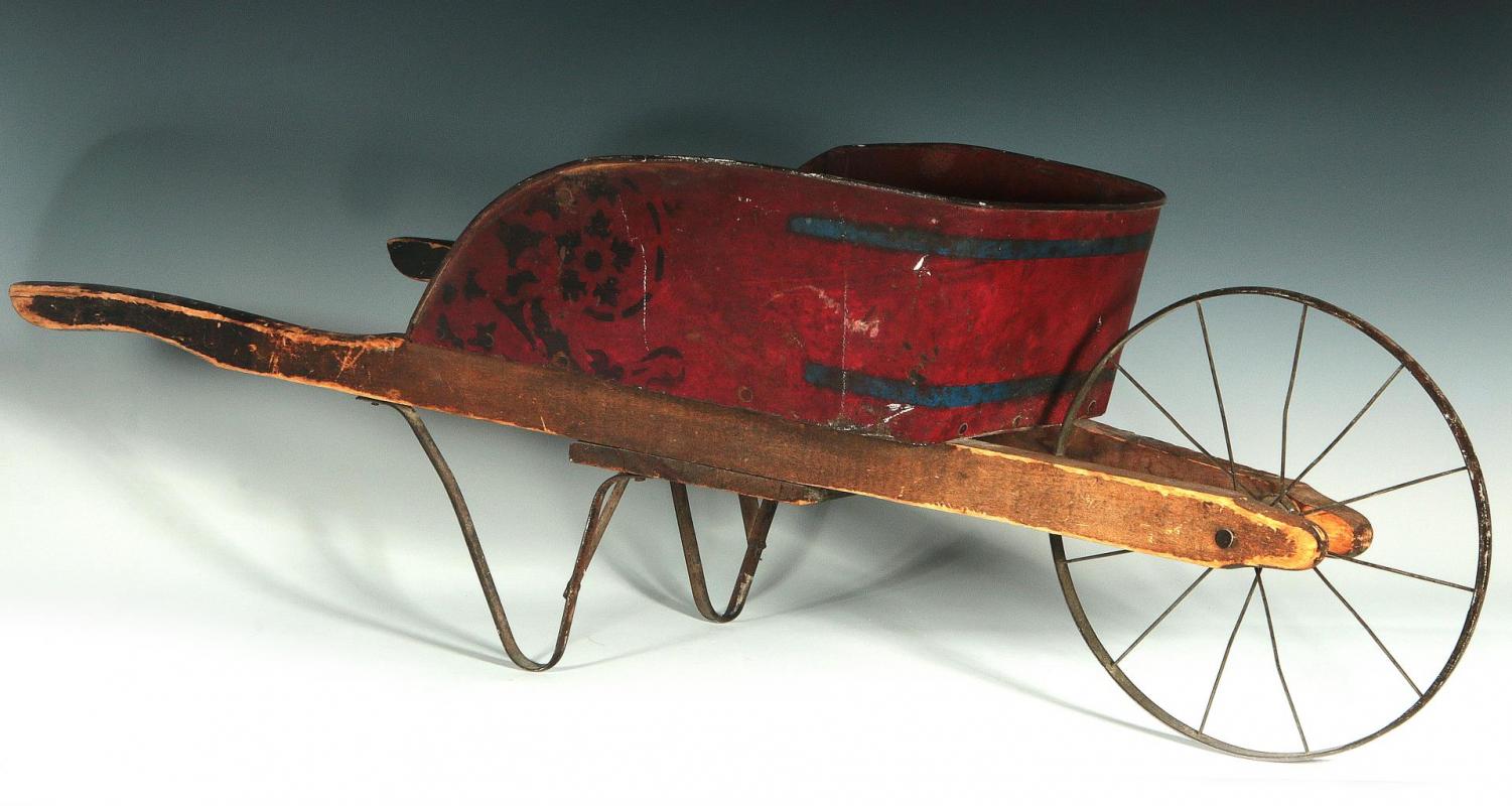A GREAT 19C. CHILD'S WHEEL BARROW IN OLD RED PAINT