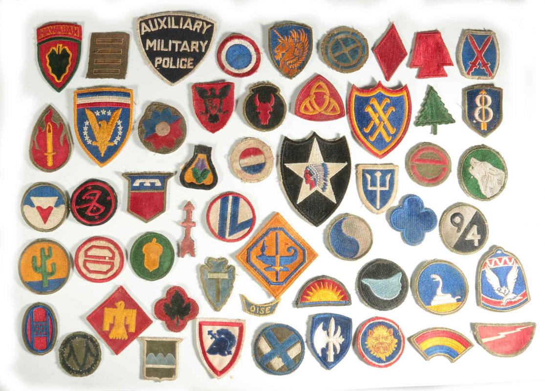 A COLLECTION OF 102 WWII-ERA US ARMY PATCHES