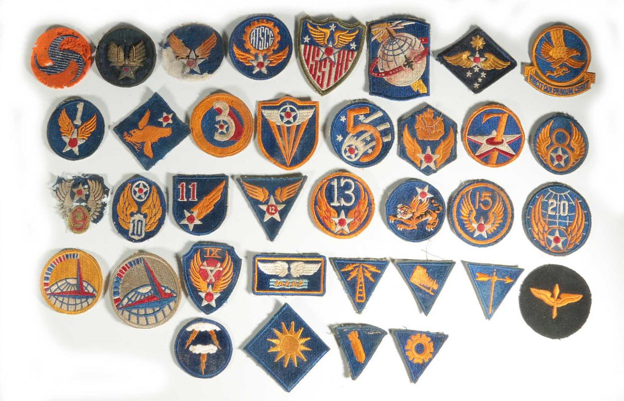 A COLLECTION OF 36 ARMY AIR FORCE AAF WWII INSIGN