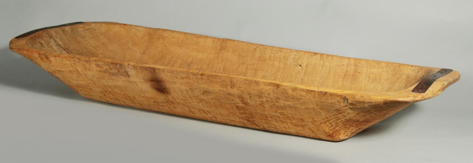 A LARGE, LONG PRIMITIVE HEWN WOOD TRENCHER BOWL