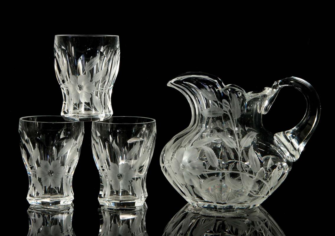 AN ABP FINELY SHAPED PITCHER AND THREE TUMBLERS