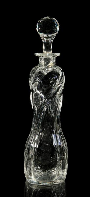 A FINE SWIRLED AND ROCK CRYSTAL CUT GLASS DECANTER