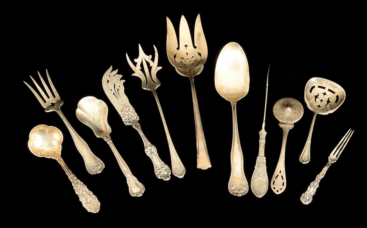 AN ESTATE LOT OF UNUSUAL STERLING SILVER UTENSILS