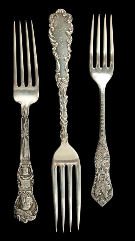 TWO STERLING SILVER SOUVENIR FORKS, PLUS ANOTHER