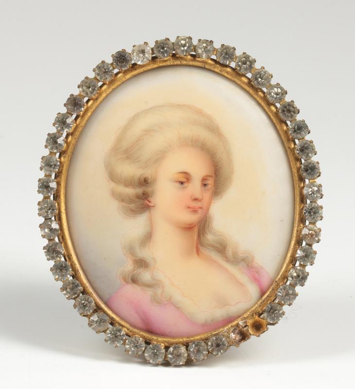 A MINIATURE PORTRAIT FRAMED WITH BRILLIANTS 